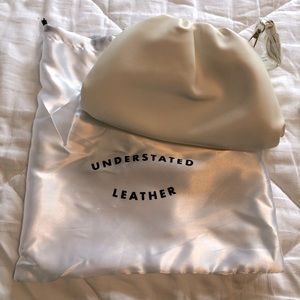 Understated leather off white clutch